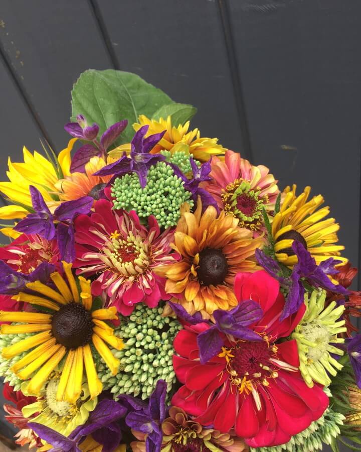 Posy flowers in a jam jar image